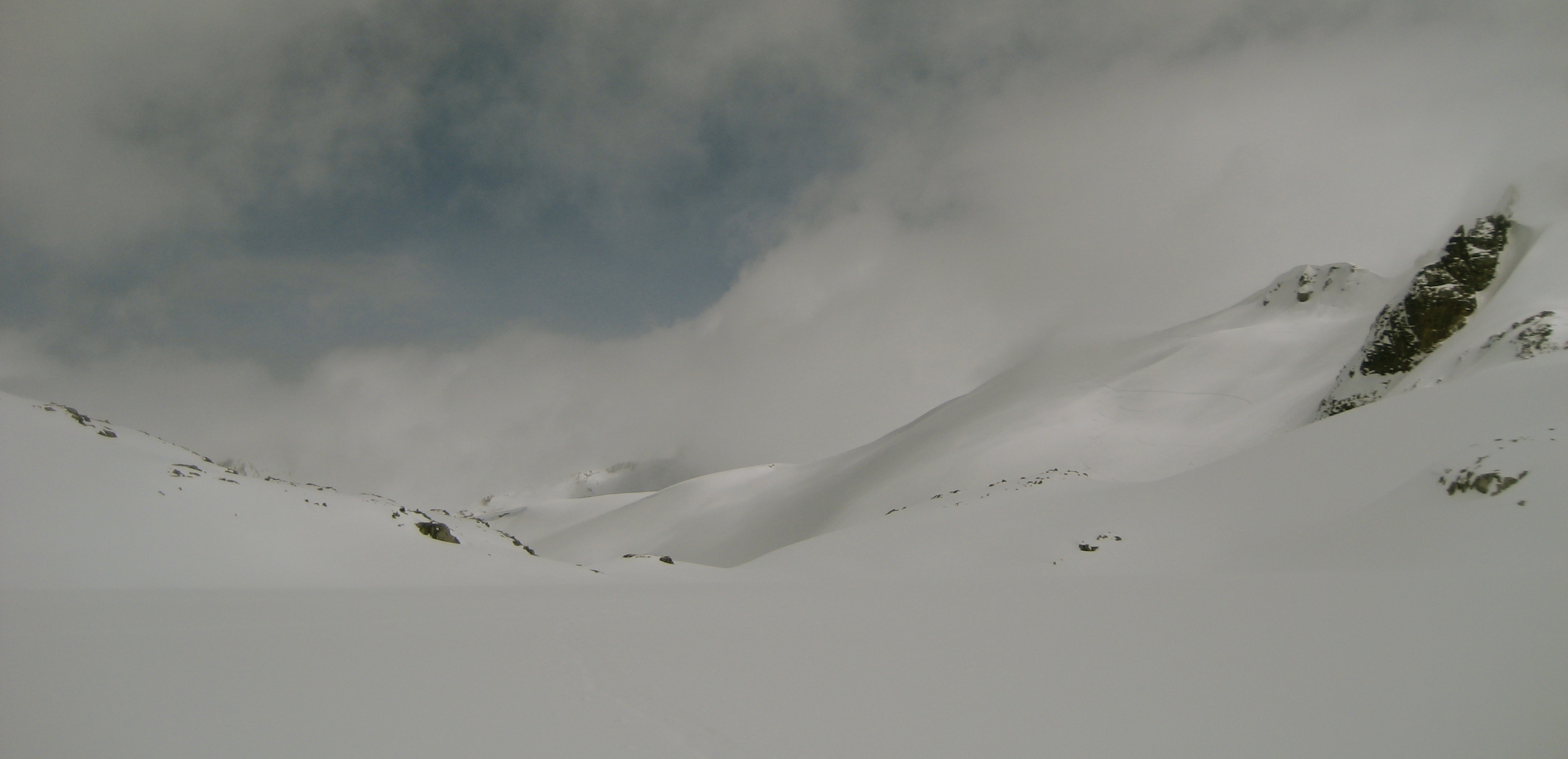 Clouds hanging over the Spearhead Traverse in the Whistler backcountry